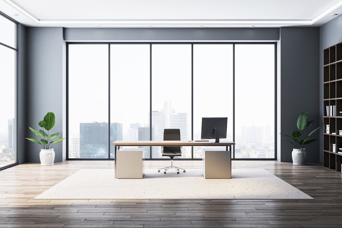 Modern executive workspace with city skyline view